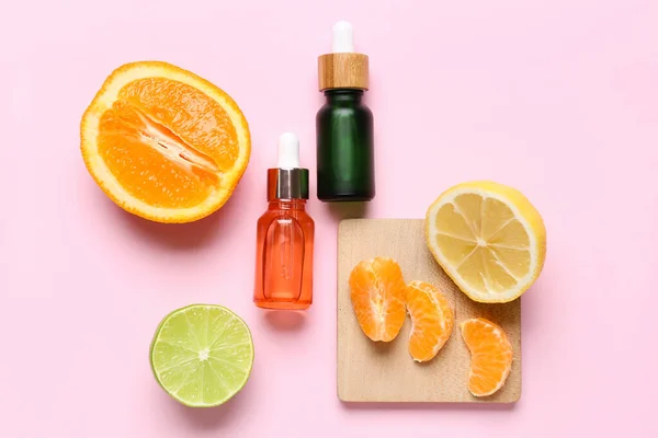 Composition Bottles Citrus Serum Fruits Pink Background — Stock Photo, Image