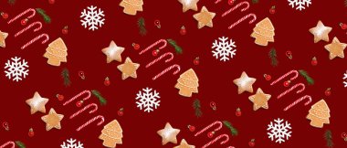 Kırmızı arka planda bir sürü zencefilli kurabiye, baston şeker ve Noel dekoru. Tasarım için desen
