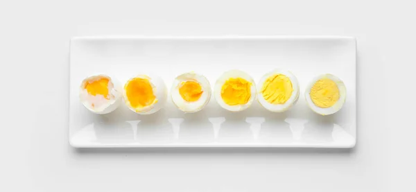 Verschillende Stadia Van Kokende Eieren Witte Achtergrond Bovenaanzicht — Stockfoto