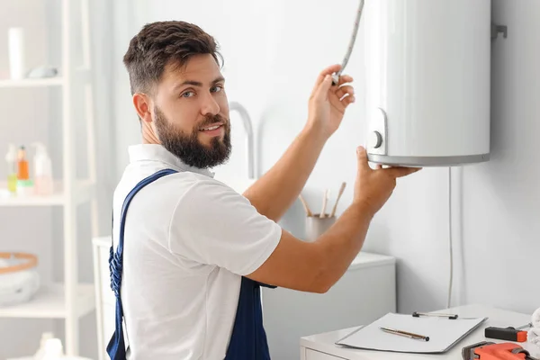 Male Plumber Repairing Boiler Bathroom — Stock Photo, Image