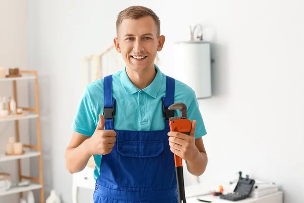 Male Plumber Pipe Wrench Showing Thumb Bathroom — Stock Photo, Image