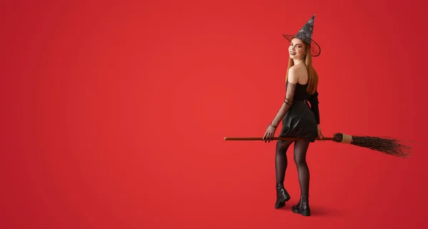 Beautiful Woman Broom Dressed Witch Halloween Red Background Space Text — Stock Photo, Image
