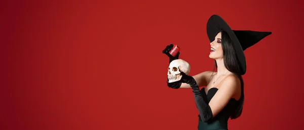 Young Witch Holding Skull Candle Red Background Space Text — Stock Photo, Image