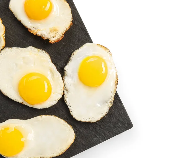 Slate Board Tasty Fried Perail Eggs Isolated White Background Closeup — стоковое фото