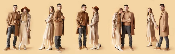 流行の若いカップルのセットで秋の服でベージュの背景 — ストック写真
