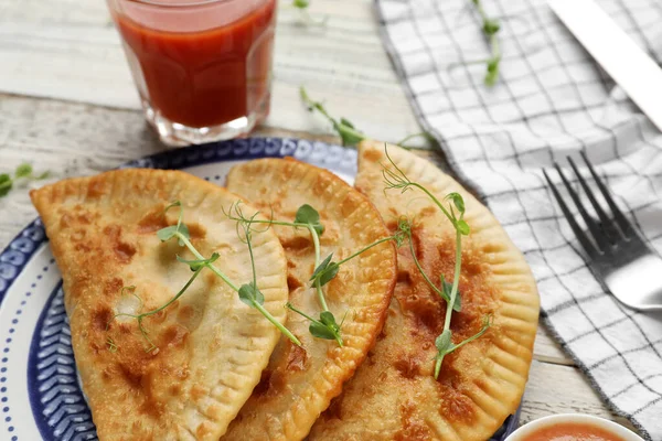 Plate Tasty Chebureks Light Wooden Table Closeup — Stock Photo, Image