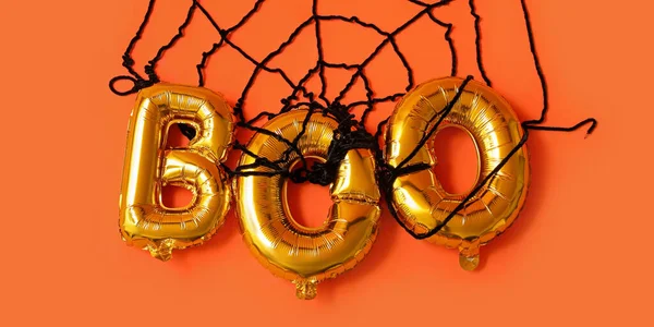Word Boo Wykonane Balonów Pajęczyny Pomarańczowym Tle Święto Halloween — Zdjęcie stockowe