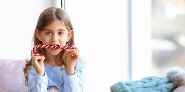 Cute Little Girl Christmas Candy Cane Window — Stock Photo, Image