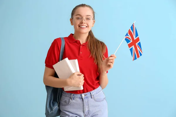 Junge Frau Mit Britischer Flagge Büchern Und Rucksack Auf Blauem — Stockfoto