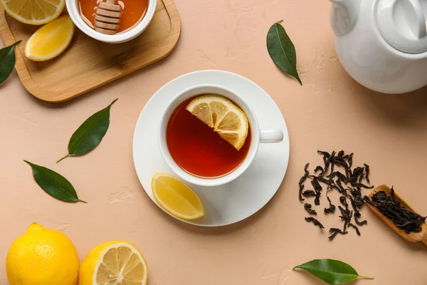 Cup Black Tea Lemon Leaves Beige Background — Stock Photo, Image