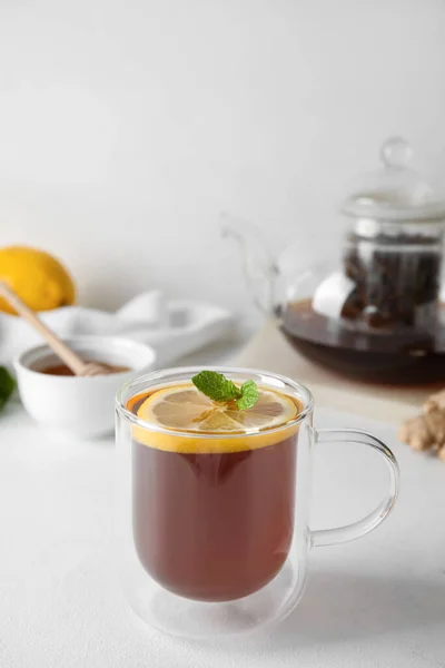 Glass Cup Black Tea Lemon Mint White Table Closeup — Stock Photo, Image