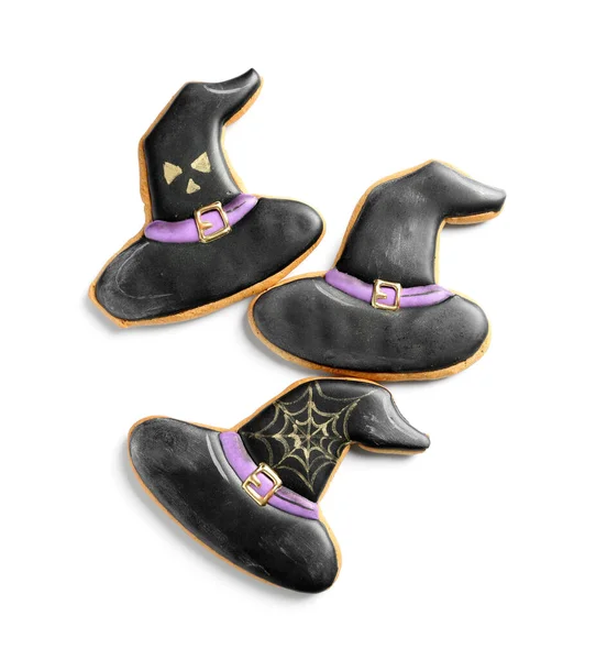 Halloween witch hat cookies on white background