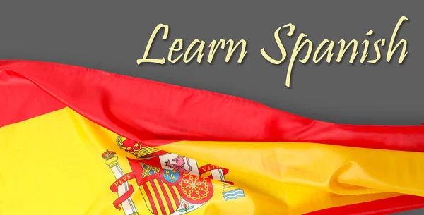 Texto Espanhol Learn Bandeira Espanha Sobre Fundo Cinza — Fotografia de Stock