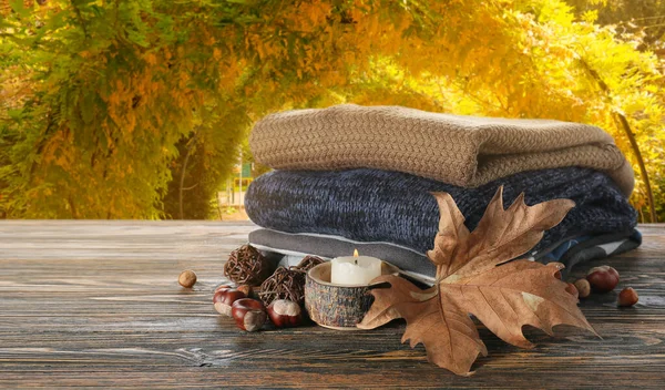 Stack Warm Sweaters Table Autumn Garden — Stock Photo, Image