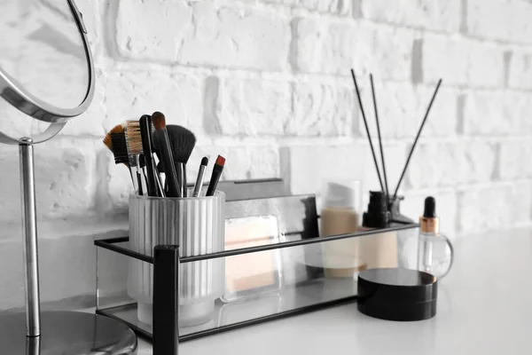 Holder Makeup Brushes Cosmetics Mirror Reed Diffuser Table White Brick — Stock Photo, Image