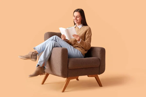 Beautiful Woman Reading Book Armchair Beige Background — Stock Photo, Image