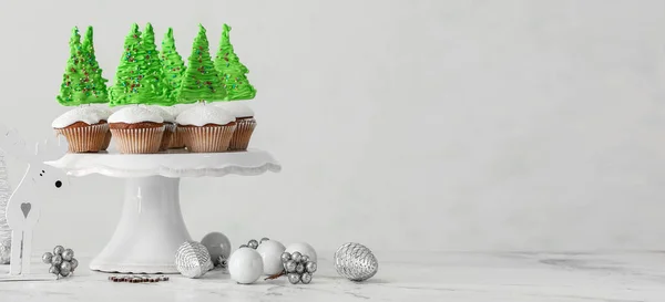Stand Tasty Christmas Cupcakes Decorations Light Background Space Text — Stock Photo, Image