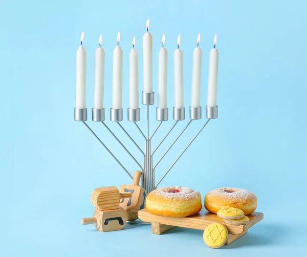 Menorah Candles Cookies Donuts Dreidels Hanukkah Celebration Blue Background — Stock Photo, Image