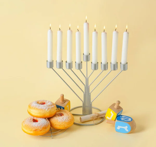 Menorah Candles Donuts Scroll Dreidels Hanukkah Celebration Yellow Background — Stock Photo, Image