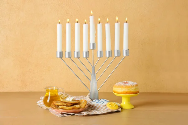 Menorah Candles Delicious Food Hanukkah Celebration Wooden Table Color Background — Stock Photo, Image