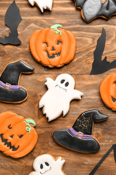 Halloween cookies on wooden background