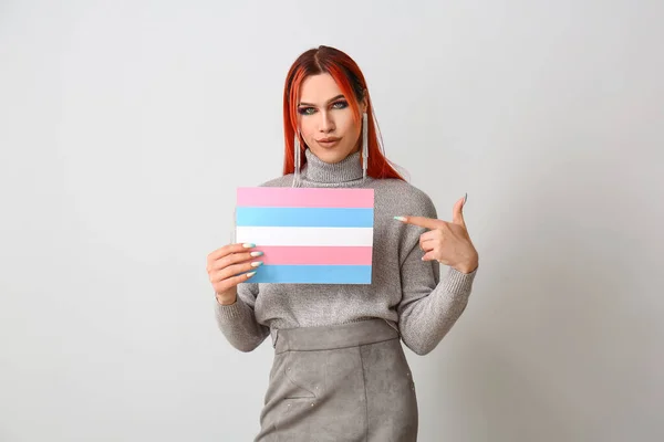 Stylish Transgender Woman Holding Transgender Flag Light Background — Stock Photo, Image
