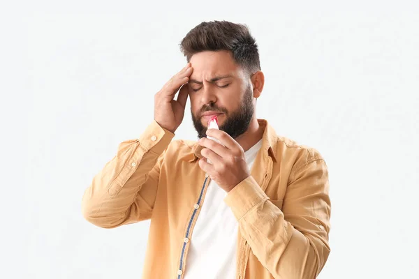 Young Bearded Man Nosebleed Tissue Light Background — Stock Photo, Image