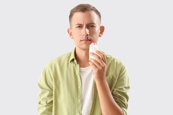 Young Man Nosebleed Tissue White Background — Stock Photo, Image