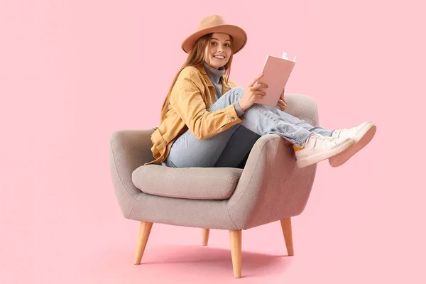Young Woman Book Sitting Armchair Pink Background — Stock Photo, Image