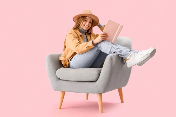 Young Woman Book Sitting Armchair Pink Background — Stock Photo, Image