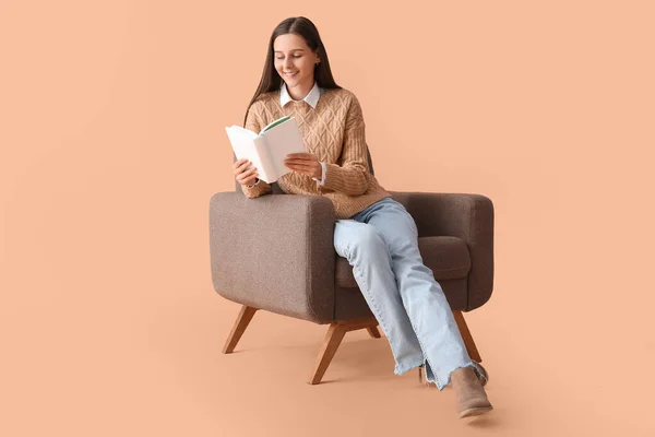 Beautiful Woman Reading Book Armchair Beige Background — Stock Photo, Image
