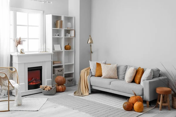 Autumn Interior Living Room Grey Sofa Fireplace Pumpkins — Stock Photo, Image