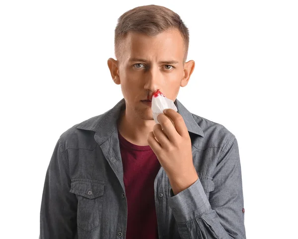 Hombre Joven Limpiando Hemorragia Nasal Con Tejido Sobre Fondo Blanco — Foto de Stock