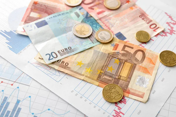 Euro Banknotes Coins Diagrams Closeup Exchange Rate Concept — Stock Photo, Image