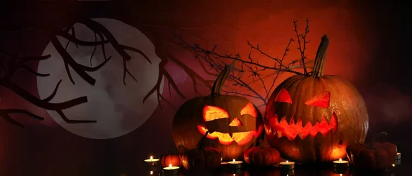 Carved Halloween Pumpkins Burning Candles Dark Background — Stock Photo, Image