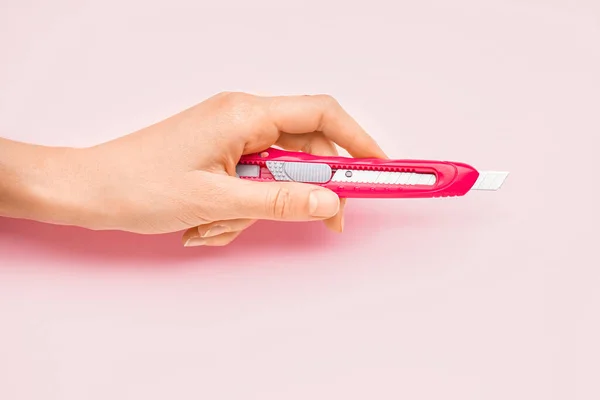 Woman Utility Knife Pink Background Closeup — Stock Photo, Image