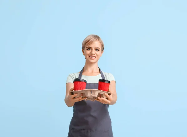 Female Barista Cups Coffee Blue Background — Stock Photo, Image