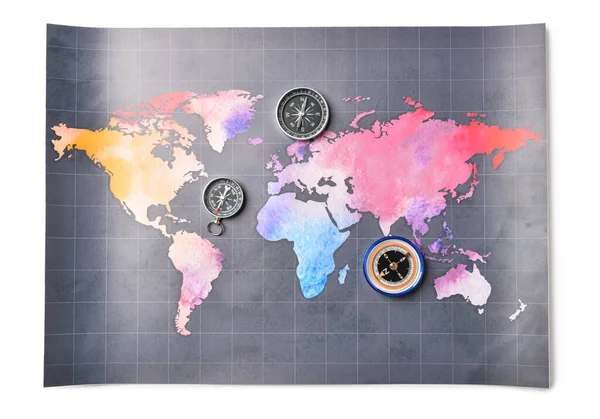 Vintage compasses and world map on white background