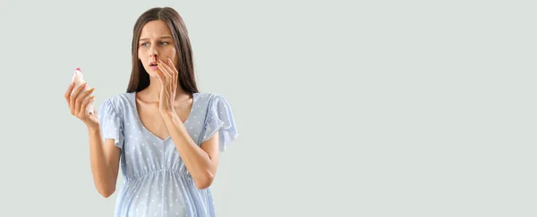 Young Pregnant Woman Nosebleed Tissue Light Background Space Text — Stock Photo, Image
