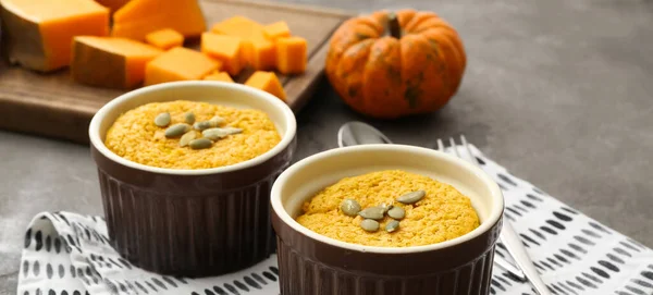 Tasty pumpkin pudding on table. Thanksgiving Day celebration