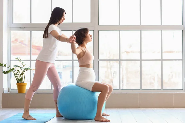 Young Woman Her Pregnant Wife Training Fitball Home — Stock Photo, Image