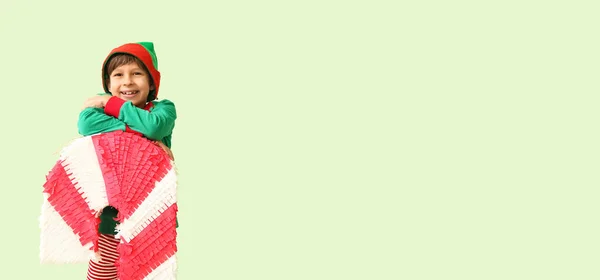 Netter Kleiner Junge Als Elfe Mit Zuckerstange Pinata Auf Hellem — Stockfoto