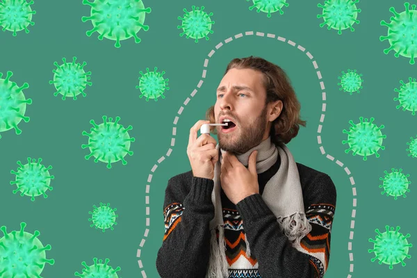 Ill man with inhaler and drawn virus on green background. Concept of immunity