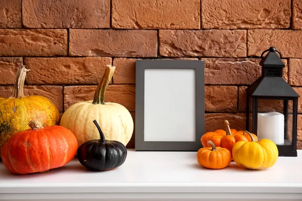 Blank Frame Halloween Pumpkins Lantern Mantelpiece Brick Wall — Stock Photo, Image