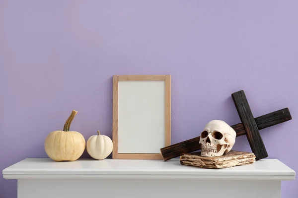 Blank Frame Halloween Pumpkins Skull Book Cross Mantelpiece Lilac Wall — Stock Photo, Image