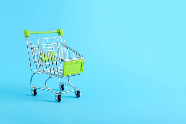 Green Shopping Cart Color Background — Stock Photo, Image