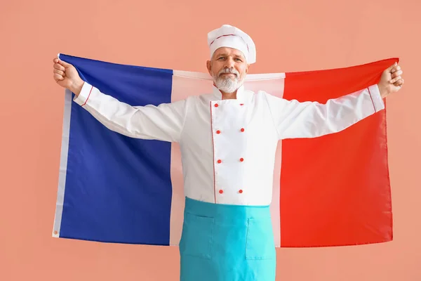 Mature Chef Flag France Beige Background — Stock Photo, Image