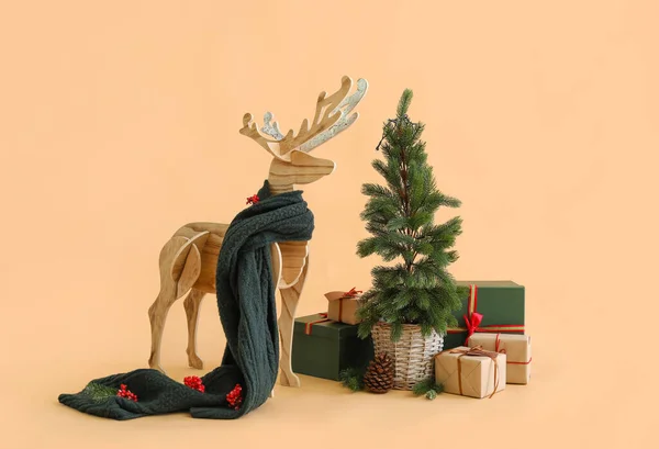 Wooden Reindeer Scarf Christmas Tree Presents Beige Background — Stock Photo, Image