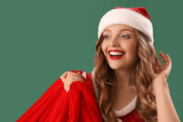 Pretty Young Woman Santa Costume Bag Green Background Closeup — Stock Photo, Image