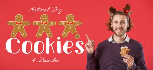 Happy young man with gingerbread cookies on red background. National Cookie Day